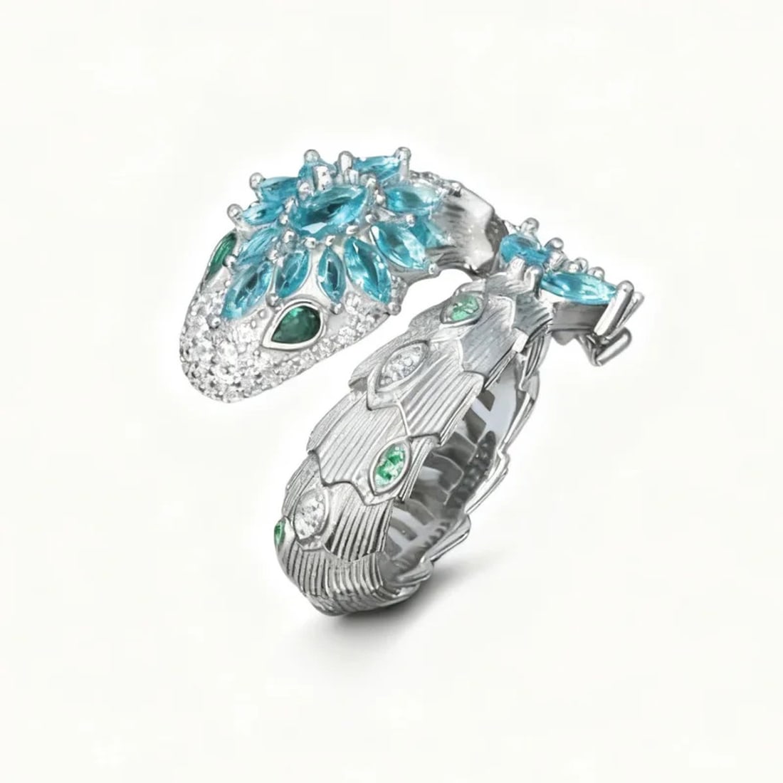 Modern Sterling Silver Zircon Synthetic Aquamarine Snake Ring: Size: Diameter 18.1 mm - Thickness 1.6 cm - Width 2.2 cm. Weight 8.53 g. Materials: 925 sterling silver, synthetic aquamarine, zircon Condition: New This captivating bypass ring is masterfully sculpte