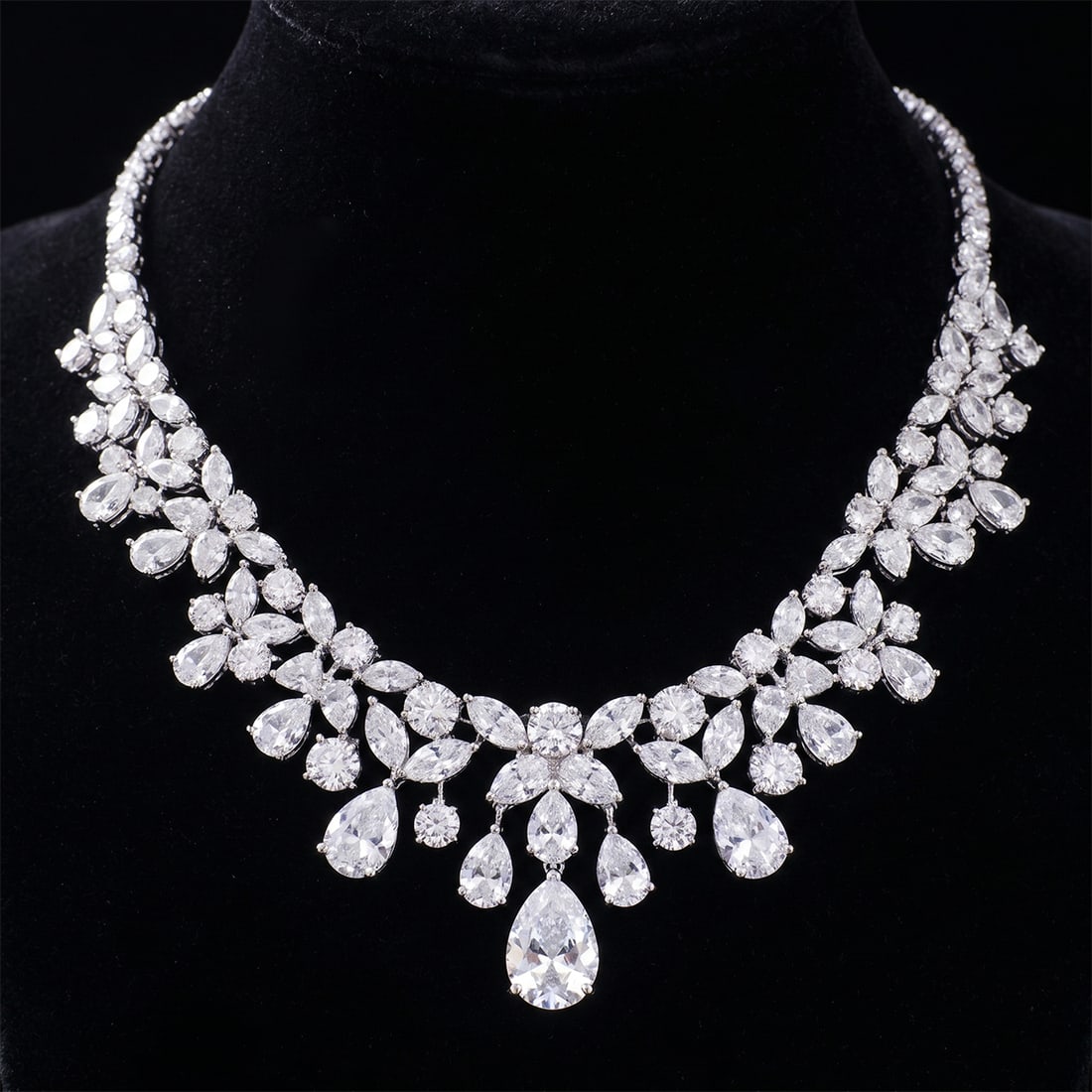 Classic Style Sterling Silver Zircon Water Drop Bib Necklace: Size: Weight 50 g. Materials: 925 sterling silver, zircon Condition: New This luxurious statement necklace features an opulent, plunging collar silhouette. The intricate metal framework is densely enc