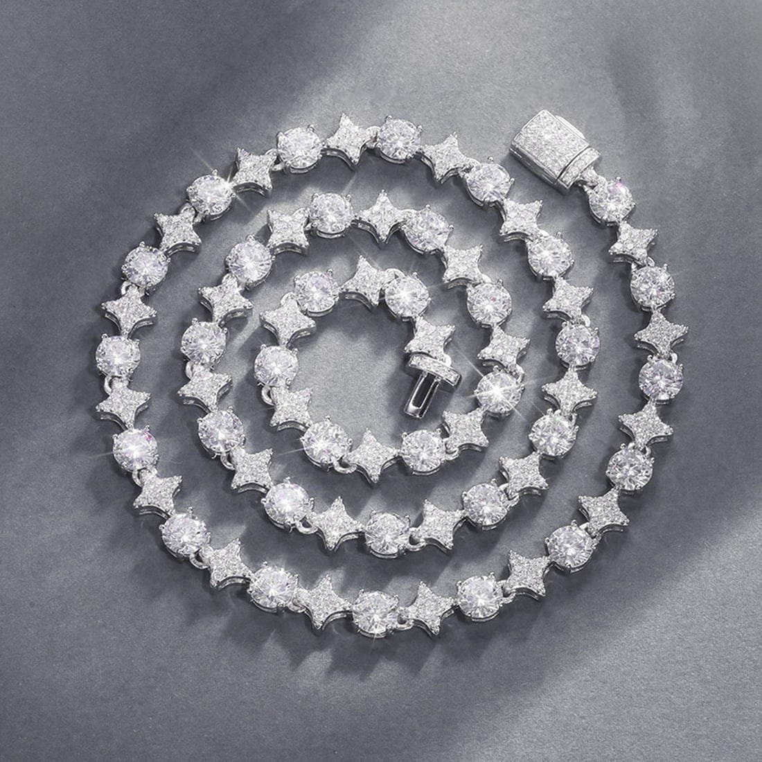 Icy Star Shaped Pendant 925 Sterling Silver Zircon: Size: Lenght 50.8 cm. Materials: S925 silver, CZ. Condition: New. This sterling silver pendant is a masterfully crafted piece of jewelry with a bold, structural profile. The centerpiece is a continuou