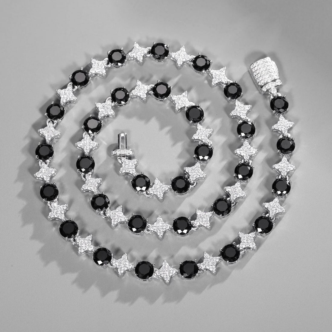 Shiny Necklace Icy Star Shaped Sterling 925 Silver: Size: Lenght 50.8 cm - Width 6 mm. Weight 39 g. Materials: S925 sterling, CZ. Condition: New. This sterling silver necklace is a masterfully crafted piece of jewelry with a bold, structural profile. T
