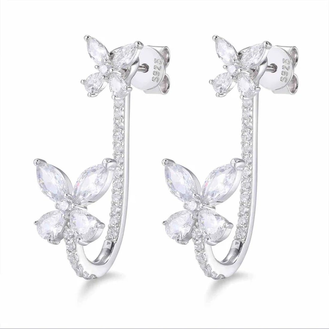 Iced Out Motif Earrings Silver 925 Moissanite: Size: Height 30 mm - Width 10 mm. Weight 4.4 g. Materials: S925 silver, moissanite. Condition: New. Crafted from sterling silver, these butterfly stud earrings feature a bold, structural profile that