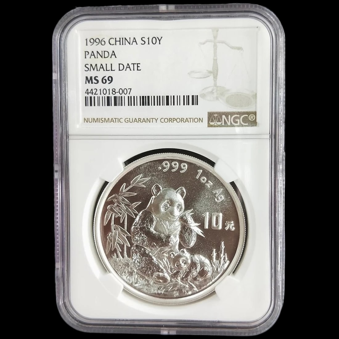 Classic Style Silver Panda Cub Bamboo Thicket Coin: Size: Diameter 4 cm - Thickness 0.3 cm - Width 4 cm. Weight 31.1 g. Materials: Silver Condition: New The obverse displays a serene composition featuring a large panda seated amidst a lush thicket of