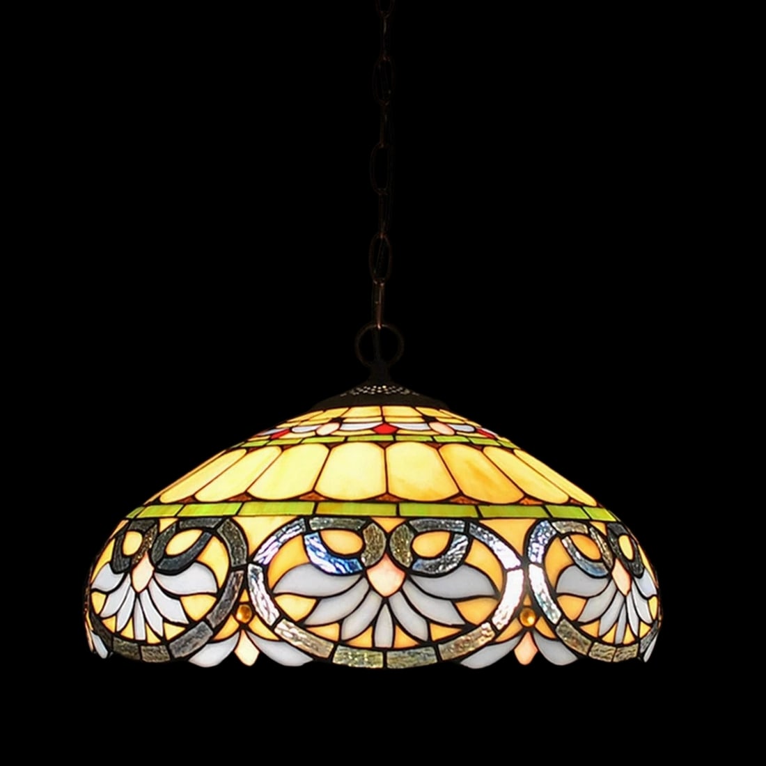 Tiffany Style Hanging Chandelier Stained Glass: Size: Height 20 cm - Width 40 cm. Weight 5.5 kg. Adjustable height 95 cm. Materials: Stained glass, metal. Condition: New. This heart-shaped chandelier is a masterfully crafted lighting fixture with a