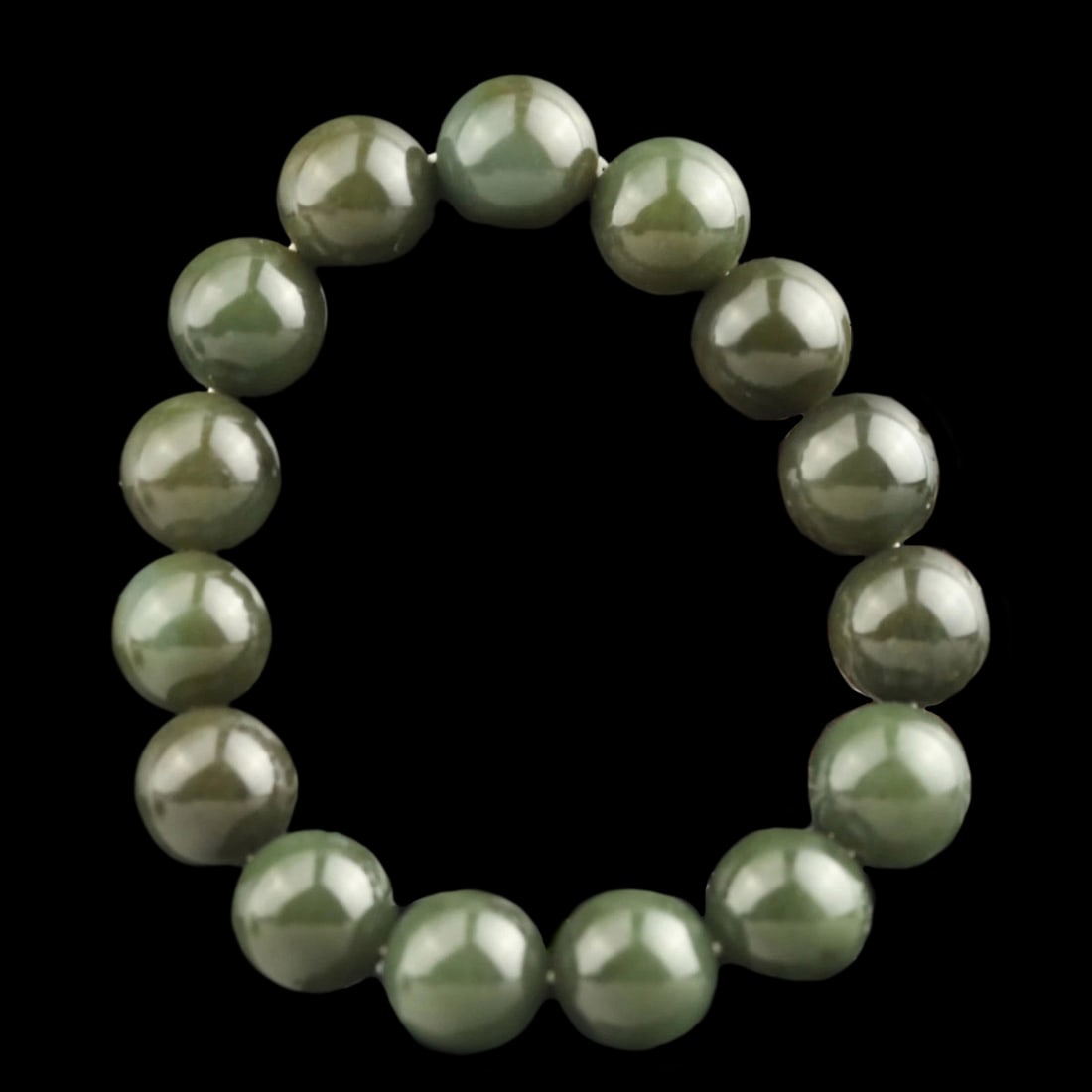 Hetian Vintage Jade Hand Carved Buddha Beads Bracelet: Size: Height 14 mm - Length 14 mm - Width 14 mm. Weight 5 g. Materials: Jade Condition: Excellent This statue bead features intricate hand-executed details crafted from stone. The surface displays smo