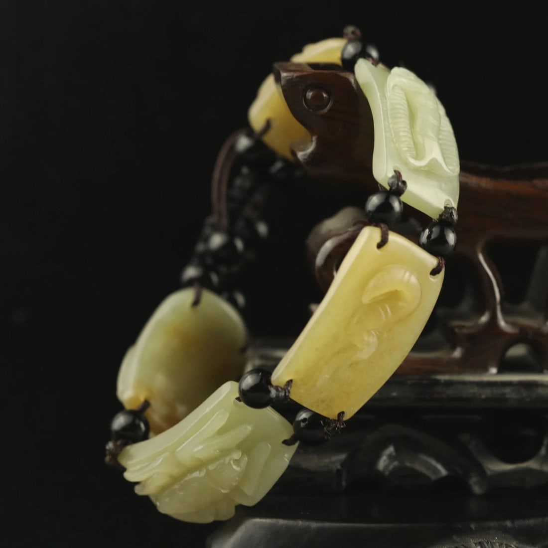 Vintage Natural Hetian Jade Hand Carved Beads Bangle Bracelet: Size: Height 3 cm - Length 1.8 cm - Width 1.8 cm. Weight 15 g. Materials: Jade Condition: Resembles a retro aesthetic This statue bead features intricate detailing carved from a single piece of stone.