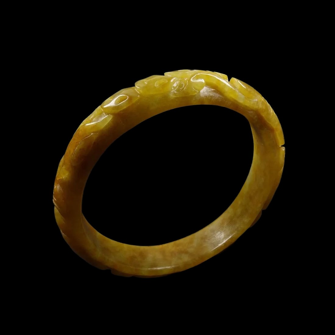 Jadeite Ruyi Fish Bangle Bracelet Retro-Inspired: Size: Inner diameter 6 cm - Width 1.25 cm - Thickness 0.75 ?m. Weight 47.8 g. Materials: Jade. Condition: Resembles a retro aesthetic. This elegant retro-inspired jadeite bangle features a warm yellow
