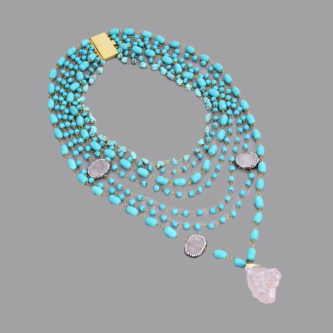 Multi-Strand Turquoise Handmade Necklace Jewelry: Size: Diameter (round turquoise) 6 mm - (rose quartz) 22x26 mm - Length 48.2-78.4 cm. Materials: Turquoise, rose quartz, marcasite, metal clasp with plated 18k gold. Condition: Flawless preservation