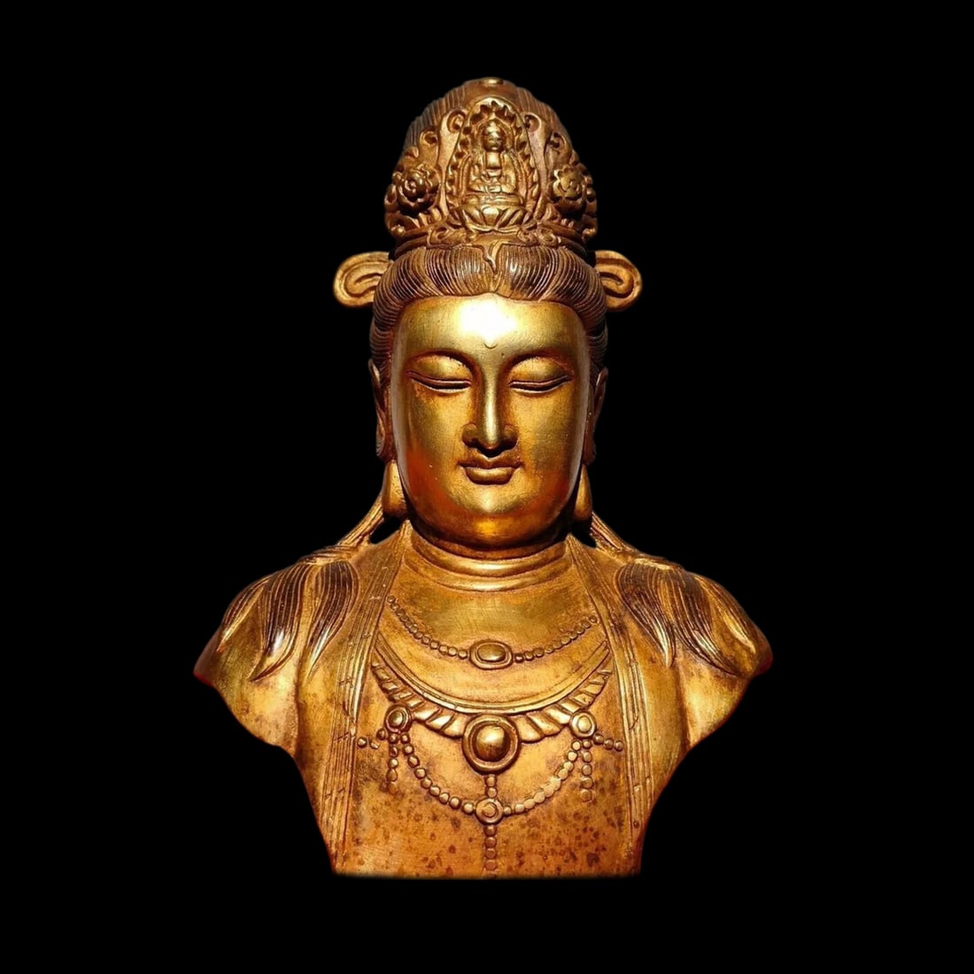 Antique Style Bronze Guanyin Wealth Sculpture: Size: Height 19.8 cm - Length 23.9 cm - Width 5.6 cm. Weight 1.6 kg. Materials: Bronze. Condition: Appears to have a classic aesthetic. This elegant bronze bust depicts the head of the Bodhisattva Gua