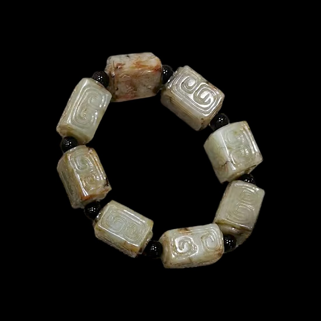 Asian Vintage-Inspired Green Jade Carved Bracelet: Size: Length 16 cm - Jade Height 1.7 cm - Jade Width 1.4 cm. Weight 65 g. Materials: Jade. Condition: Looks like vintage. This bracelet features hand-carved green jade beads, each showcasing intricate