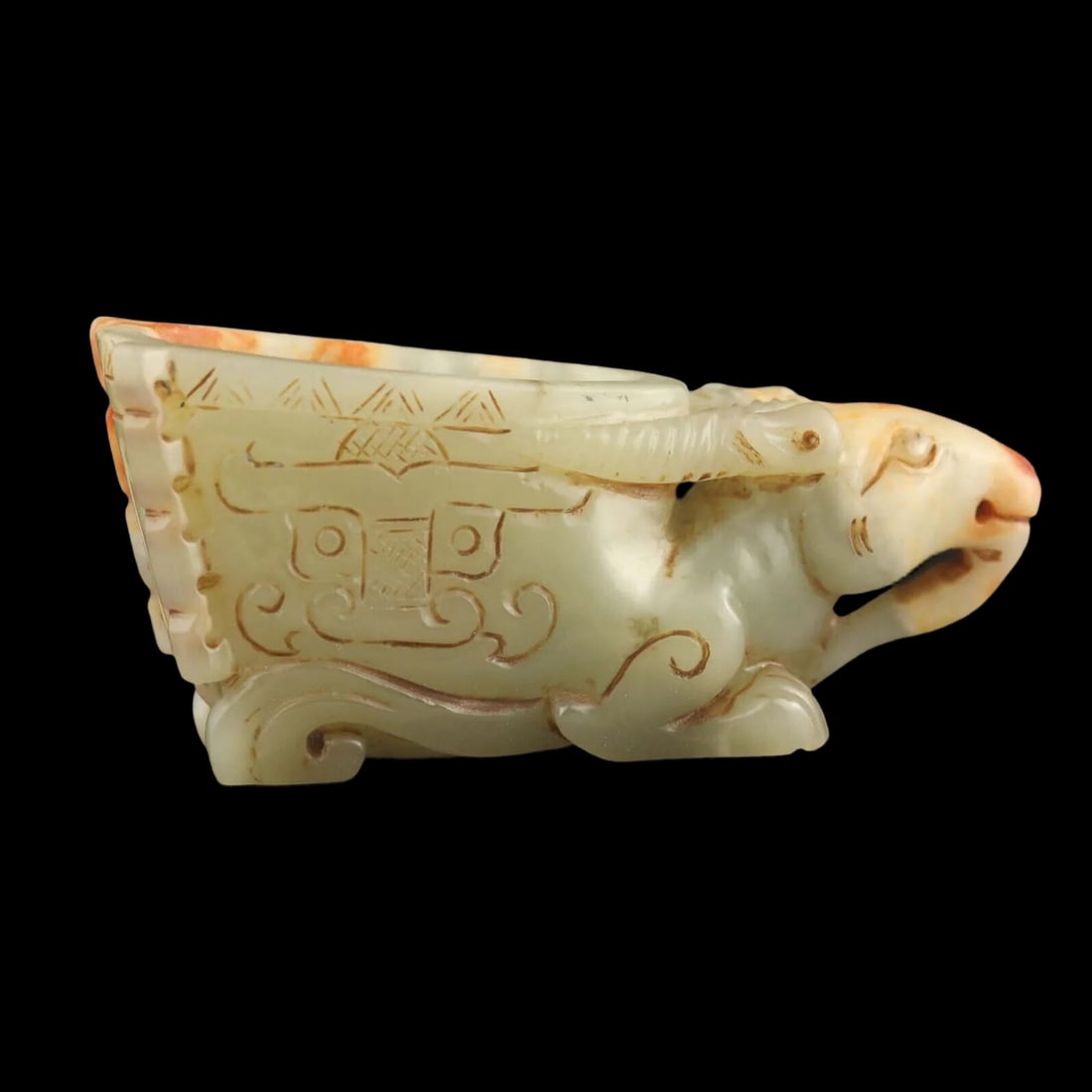 Asian Jade Sculptural Mythical Creature Horned Vessel: Size: Height 4.1 cm - Length 9.2 cm - Width 2.4 cm. Weight 127 g. Materials: Jade Condition: Appears to have a classic aesthetic The sculptural vessel is intricately carved into the form of a resting 