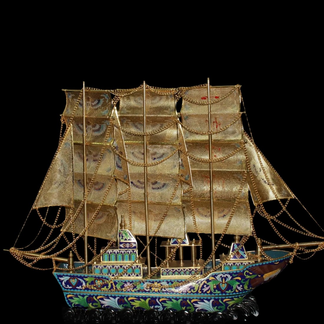 Elaborate Cloisonne Enamel Ship Sculpture Featuring Bird Motif Sails: Size: Height 53 cm - Length 71 cm - Width 11 cm. Weight 6.99 kg. Materials: Bronze, enamel, Tibetan silver (alloy of tin with copper or zinc) Condition: Appears to have a classic aesthetic This elabor