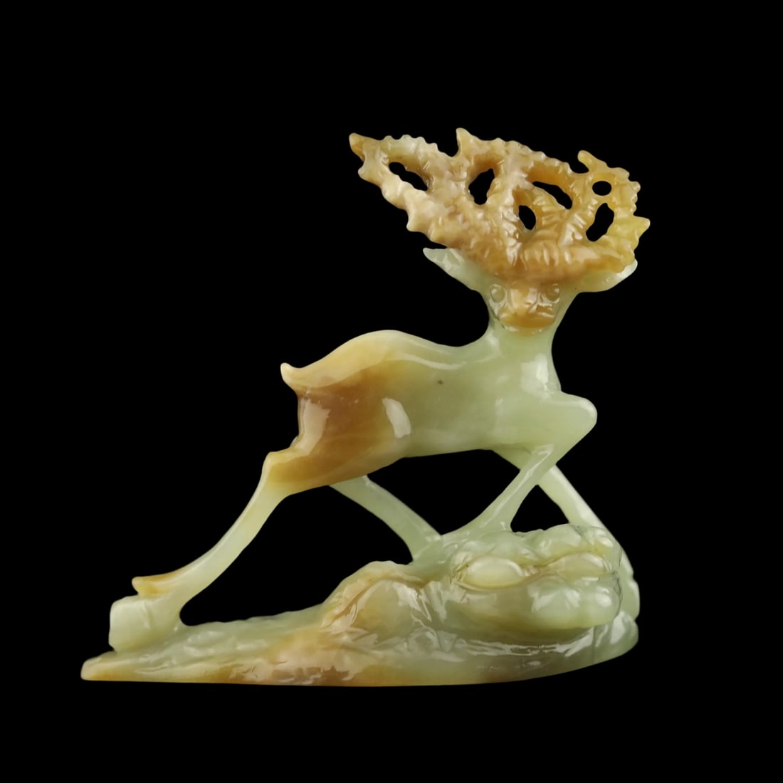Sculpture Deer Green Jadeite Hand Carved Figurine: Size: Height 5.9 cm - Length 5.7 cm - Width 2.3 cm. Weight 37 g. Materials: Jade Condition: Appears to have a classic aesthetic This elegant sculpture captures a graceful deer in a dynamic, forward-le