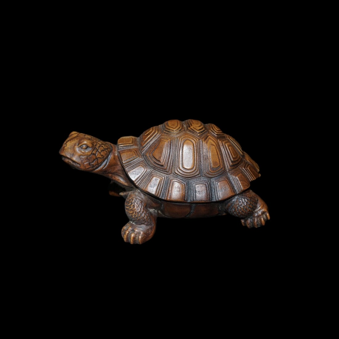 Vintage Wood Boxwood Hand Carved Tortoise Animal Statue: Size: Height 5 cm - Width 7.8 cm. Weight 70 g. Materials: Boxwood Condition: Excellent The vintage style turtle features intricate hand carved work with distinct relief patterns covering its surface. 