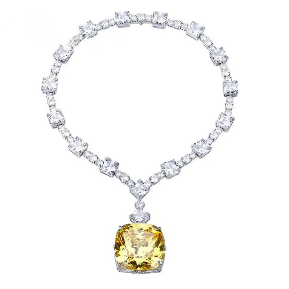 Striking Silver Necklace Cushion-cut Citrine Gem: Size: Length 52 cm. Weight 175 g. Materials: 925 sterling silver, moissanite, citrine Condition: New This striking statement necklace features a massive, cushion-cut yellow stone as its centerpiece, r