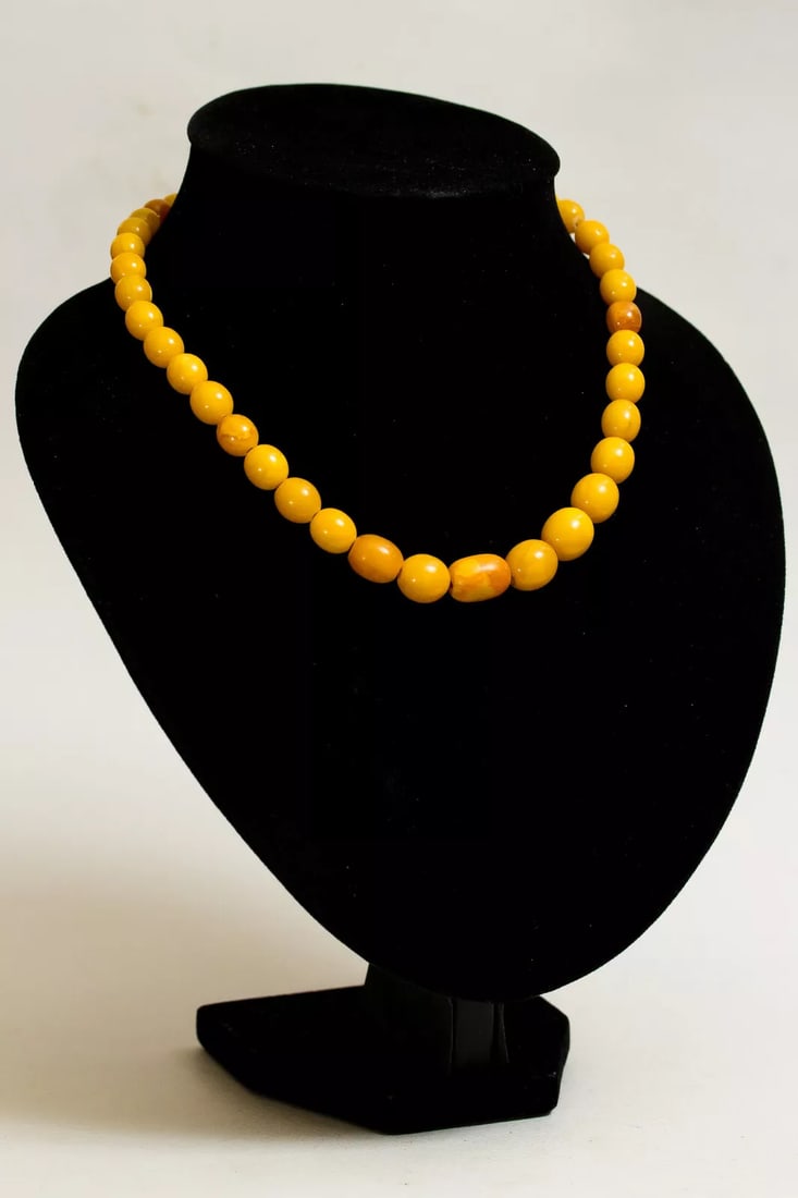 Baltic Amber Antique Necklace Royal Butterscotch Egg Yolk Tones: Extremely rare find royal 100% natural vintage Baltic amber necklace Weight: 26 gr Size of beads: 7-11 mm Length: 410 mm Treatment: no Condition - as on the pictures (good, has some cracks, one bead w