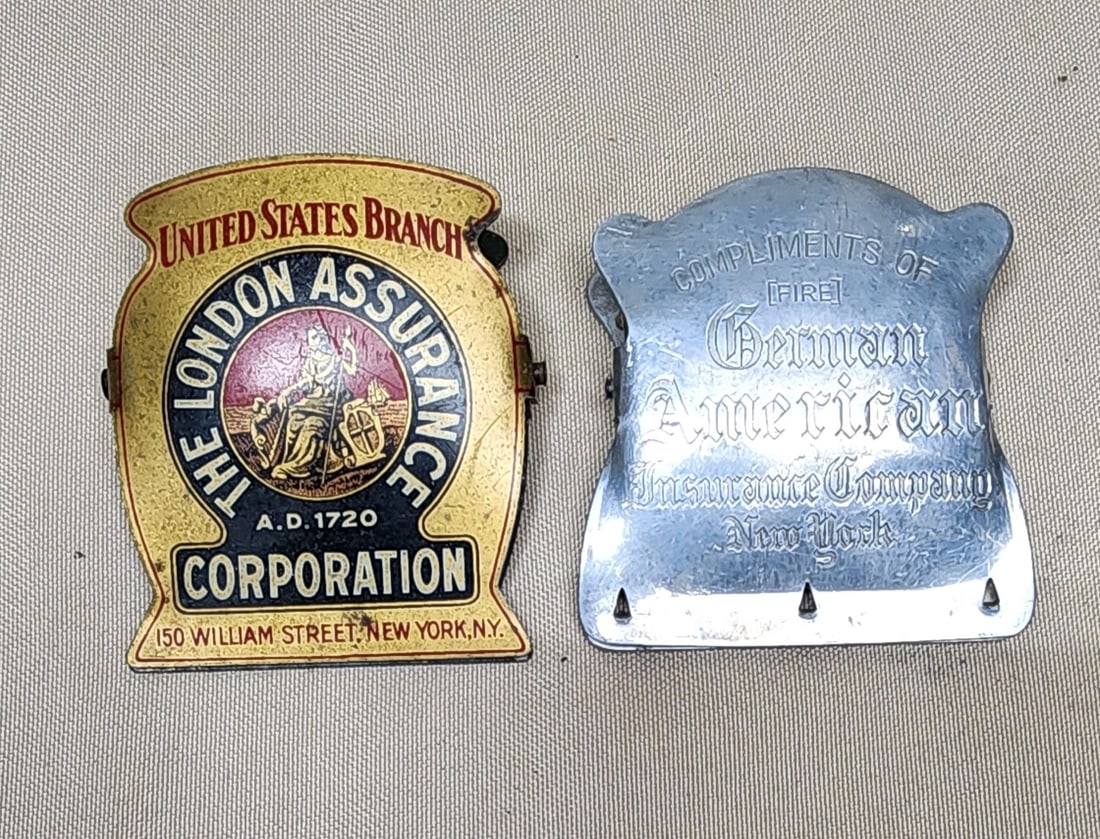 2 Fire Insurance Advertising Clip: Lot of 2 fire insurance advertising desk clips. These each measure approximately 2 1/2" by 3" and are complete with their spring clips and are in working order. The first is from The London Assurance 