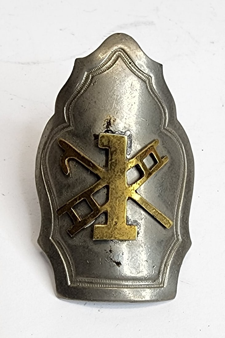 Cairns Brothers Neckerchief Slide: Cairns and Bros neckerchief slide from a hook and ladder company.