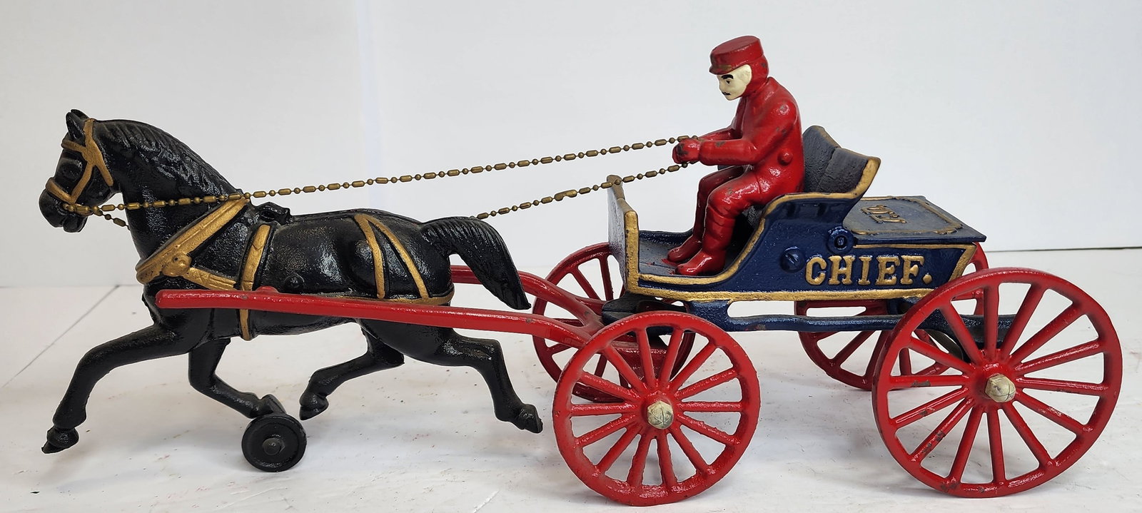 Reproduction Cast Iron Fire Chief Buggy: Reproduction cast iron fire chief's buggy 16" long complete