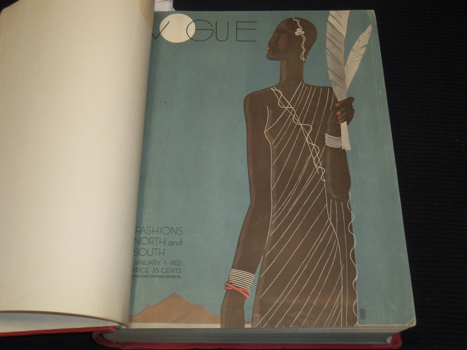1933 JANUARY-JUNE VOGUE MAGAZINE BOUND VOLUME - GREAT COVERS - ADS: This is a bound volume of Vogue magazine from January-June 1933. There are a total of 12 issues, all of the covers are present. This is an ex-library volume, we did notice several pages that were remo