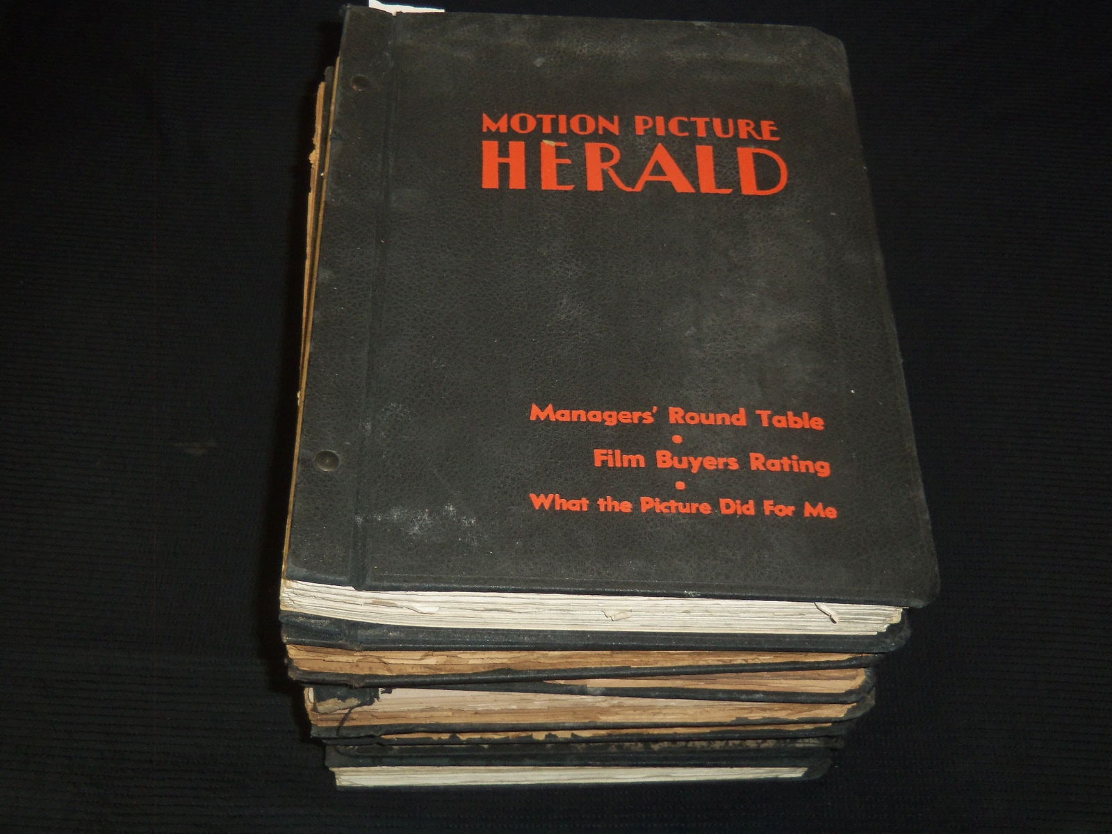 1950-1960 MOTION PICTURE HERALD VOLUMES - 7 TOTAL: Lot of 7 volumes of the Motion Picture Herald volumes from 1950 to 1960.