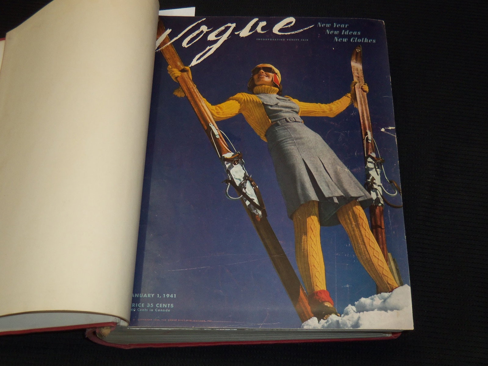 1941 JANUARY-JUNE VOGUE MAGAZINE BOUND VOLUME - GREAT COVERS - ADS: This is a bound volume of Vogue magazine from January-June 1941. There are a total of 12 issues, all of the covers are present. This is an ex-library volume, we did notice some pages excised from the 