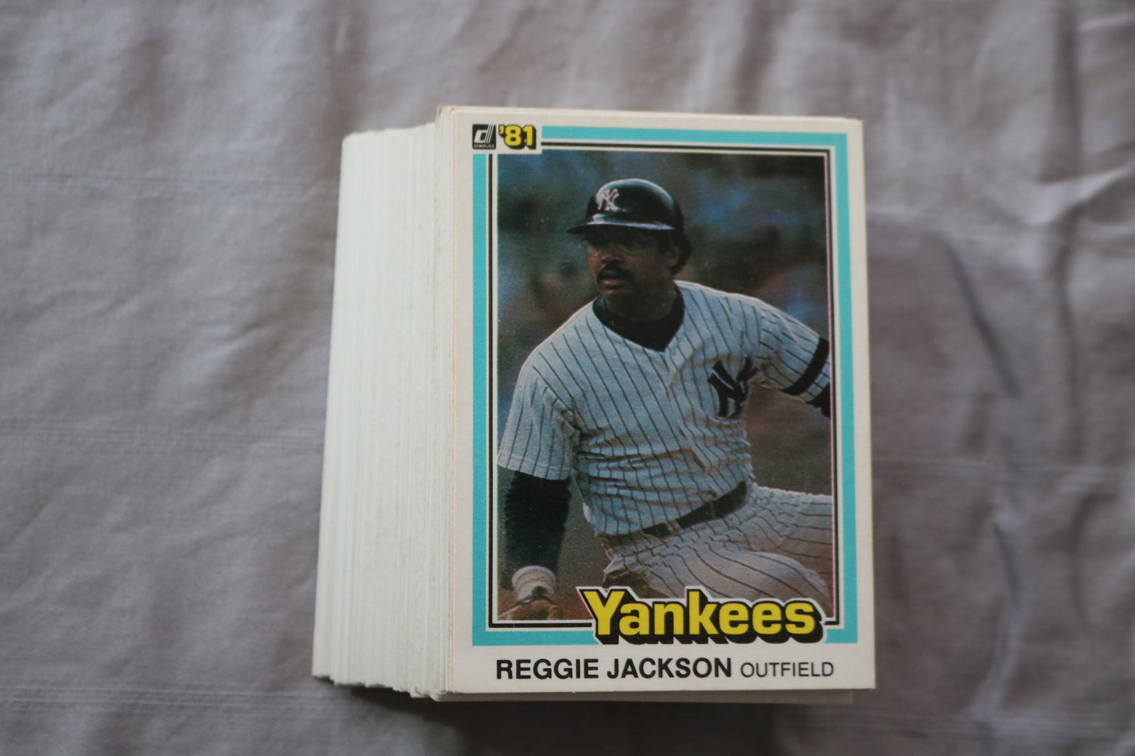 REGGIE JACKSON 1981 DONRUSS BASEBALL CARDS - CARD #468 - NEAR MINT TO MINT CONDITION - LOT OF 78: This is a lot of 78 1981 Reggie Jackson Donruss, card number 468, baseball cards. The cards are in near mint to mint condition.
