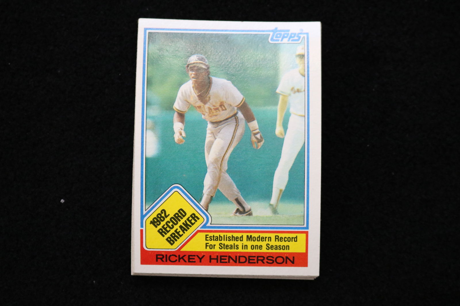RICKEY HENDERSON RECORD BREAKER 1983 TOPPS BASEBALL CARD -#2 -NEAR MINT TO MINT CONDITION-LOT OF 12: This is a lot of 12 Rickey Henderson 1983 Record Breaker Topps, card number 2, baseball cards. The cards are in near mint to mint condition.