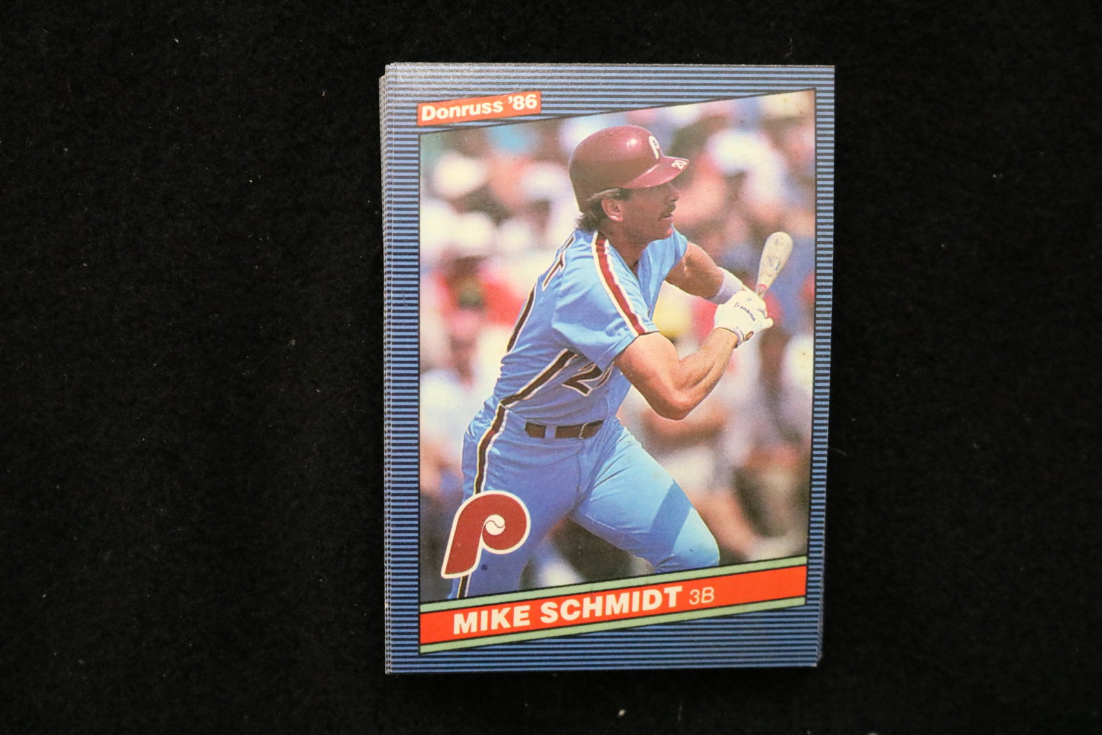 MIKE SCHMIDT 1986 DONRUSS BASEBALL CARDS - CARD #61 - NEAR MINT TO MINT CONDITION - LOT OF 27: This is a lot of 27 Mike Schmidt 1986 Donruss, card number 61, baseball cards. The cards are in near mint to mint condition.