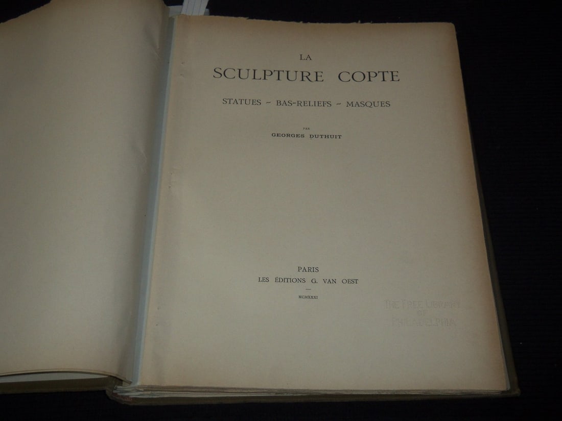 1931 LA SCULPTURE COPTE PAR GEORGES DUTHUIT FRENCH VOLUME - 72 PLATES: This is a hardcover volume titled, "La Sculpture Copte: Statues, Bas-Reliefs, Masques" by Georges Duthuit. This volume is from 1931 and there are a total of 72 pages. The text is in Frennch.