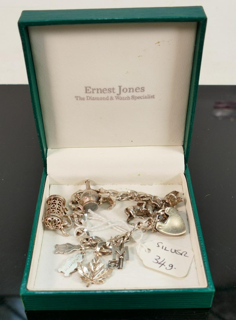 Silver charm bracelet with 9 charms, 34g:: Silver charm bracelet with 9 charms, 34g: