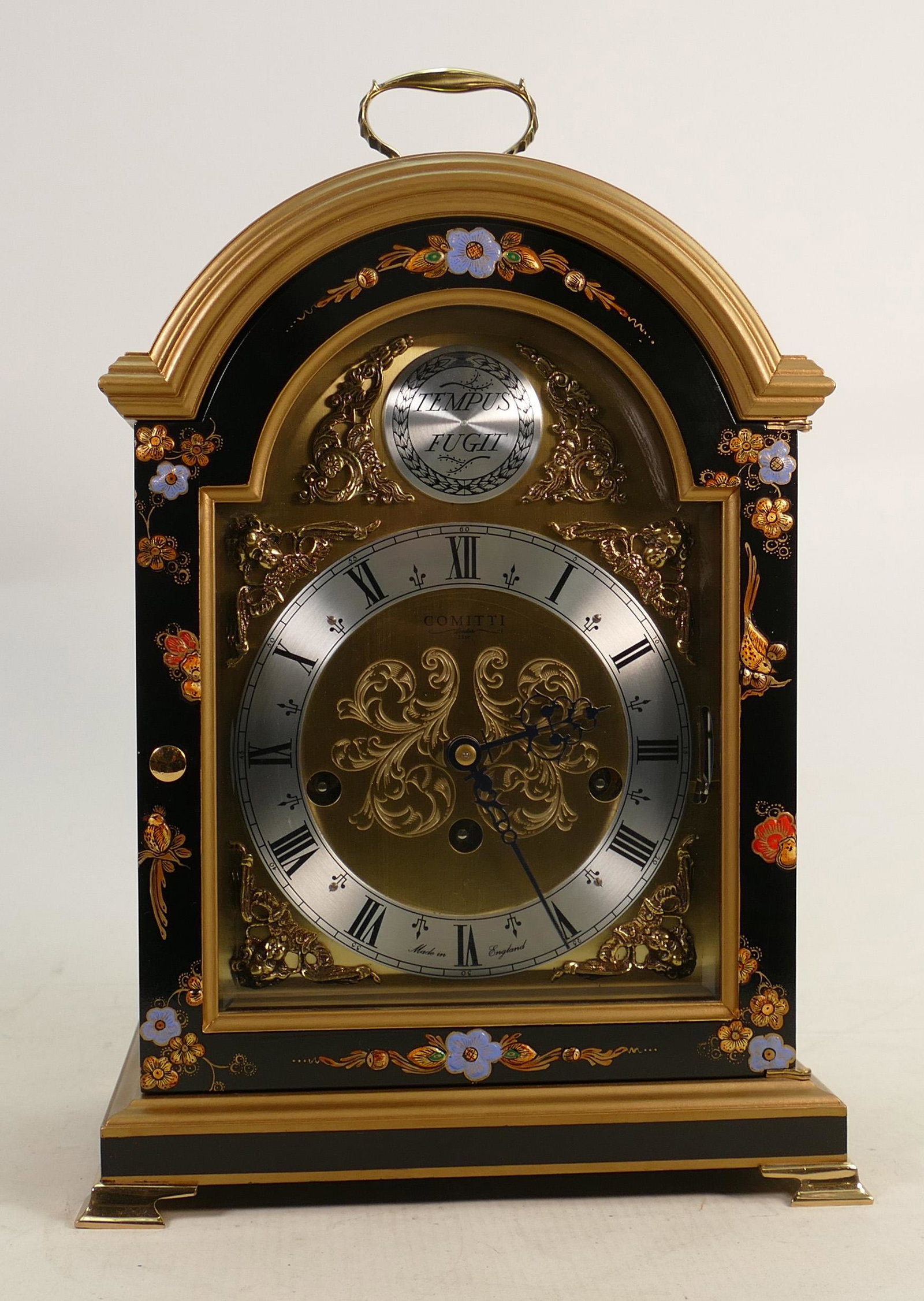 Comitti of London lacquered 3 hole Mantle clock: High: Comitti of London lacquered 3 hole Mantle clock: High quality movement noted, height 35cm.