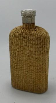 Large Wicker clad spirit bottle: With pewter screw top: Large Wicker clad spirit bottle: With pewter screw top lid, height 22cm.