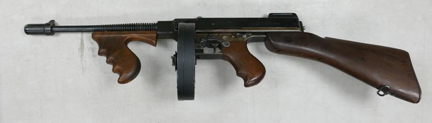 Thompson sub machine gun: With both drum and stick: Thompson sub machine gun: With both drum and stick magazines with some moving parts, 1990s and a 2021 deactivation certificate. UK shipping only.