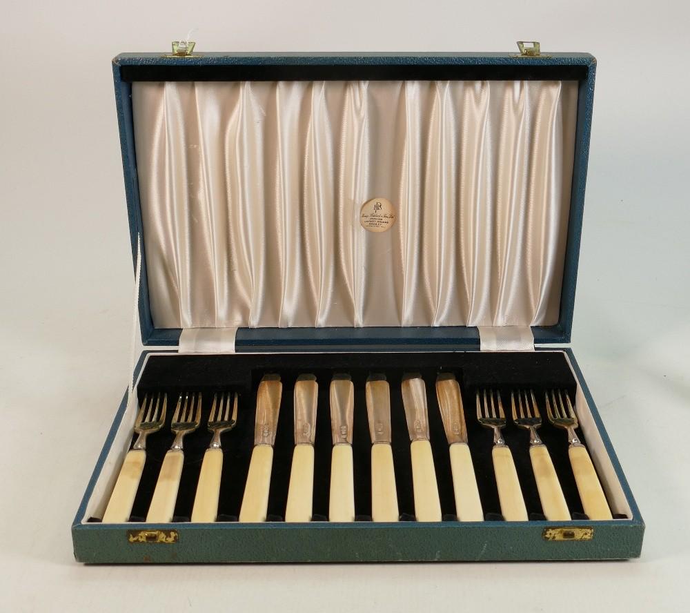 Set of hallmarked silver fish knives ad forks for six:: Set of hallmarked silver fish knives ad forks for six: Cased set with silver blades, Sheffield 1966.