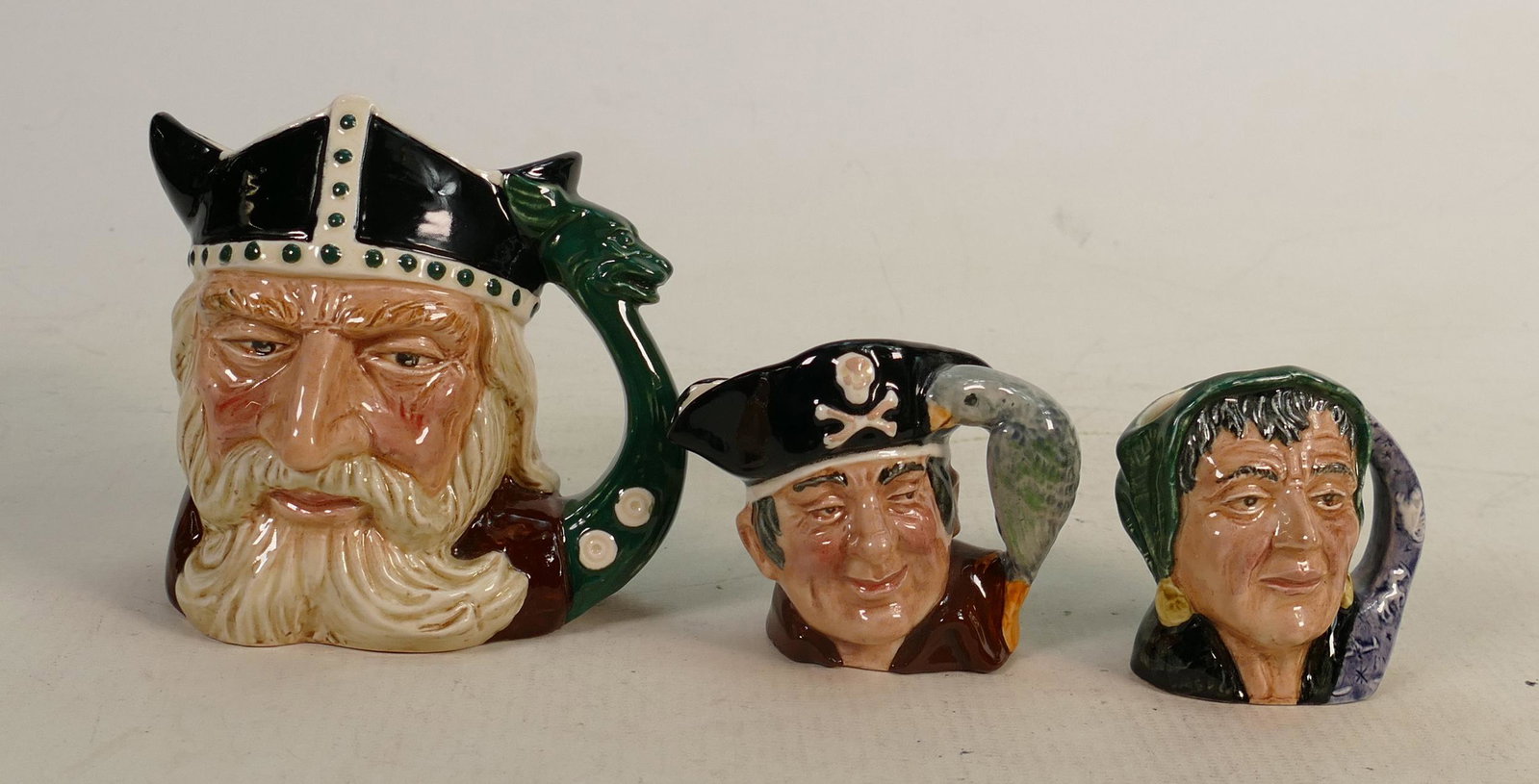 Royal Doulton Small Character Jug Viking: together with: Royal Doulton Small Character Jug Viking: together with miniature Fortune Teller D6523 & un marked Long John Silver(3)