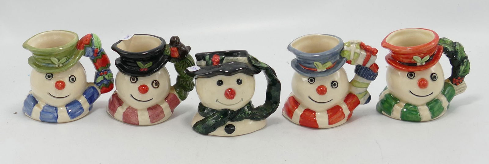 Royal Doulton set of miniature snowman character jugs (1 of 1)