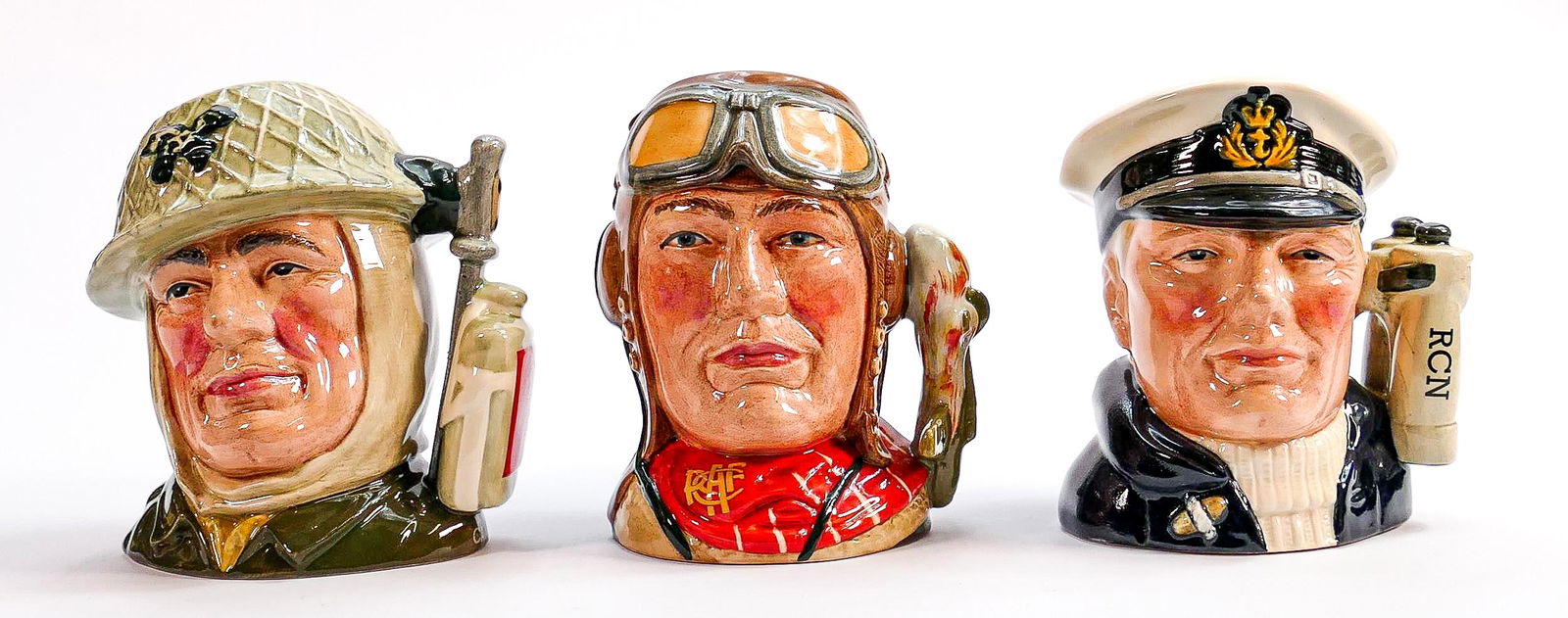 Royal Doulton scarce set of small character jugs: The (1 of 3)