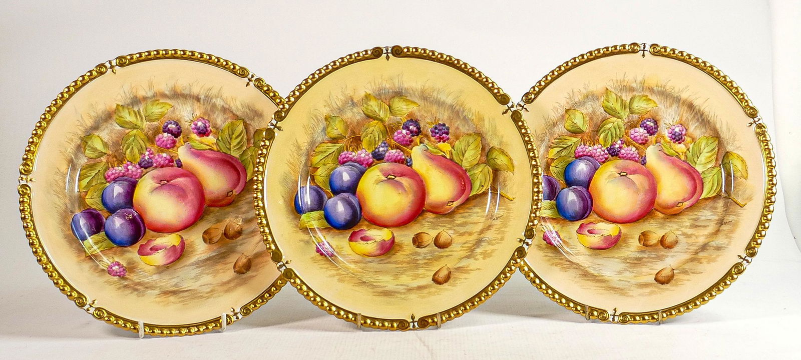 Set of 3 Aynsley Orchard Gold patterned cabinet plates all signed N.Brunt: Diameter of each 26cm (3) (1 of 3)