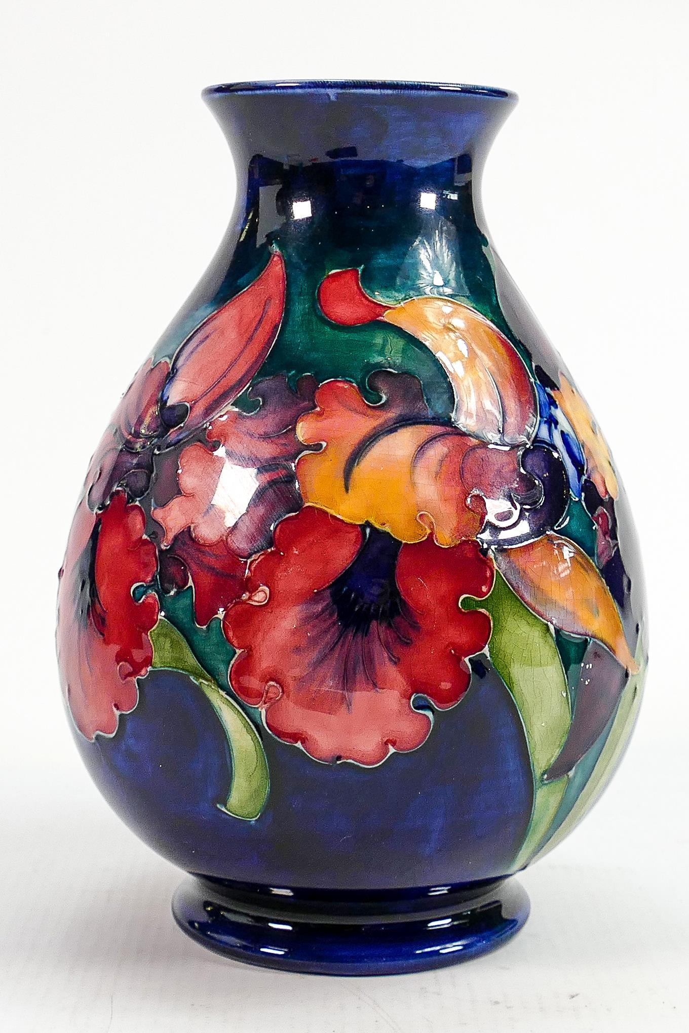 Moorcroft Orchid on blue ground vase: Height 19cm (1 of 3)