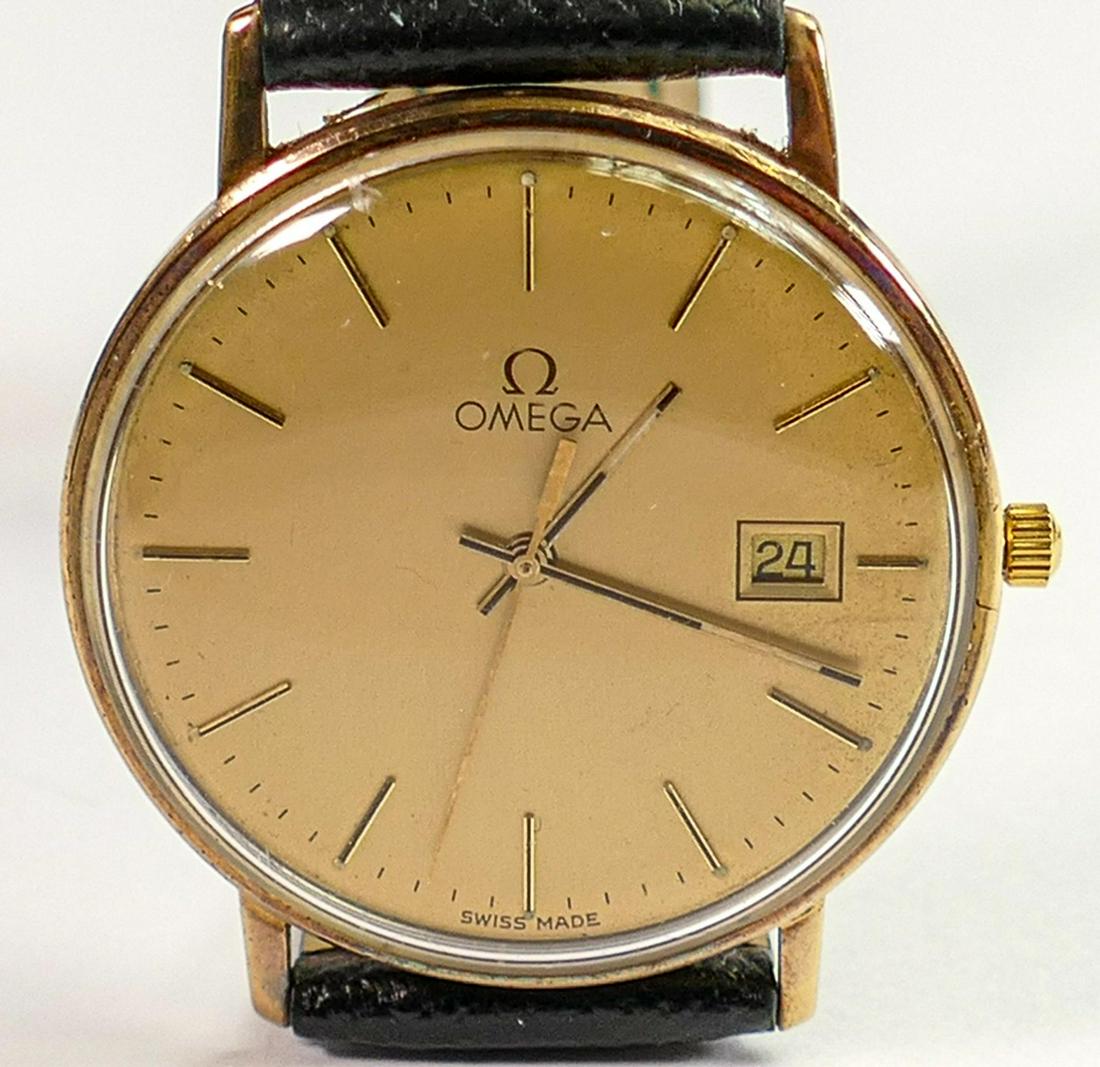 Omega 9ct gold gentlemans date quartz wristwatch: With leather strap in original box. (1 of 2)