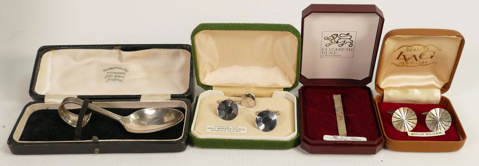 Group of silver items including 2 pairs of cased sterling silver cuff links, tie pin & cased silver (1 of 1)