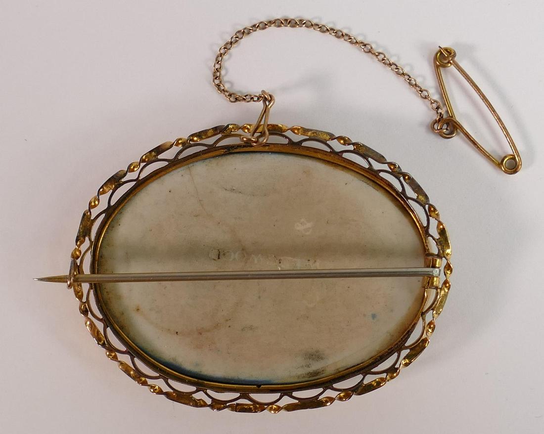 19th century 9ct gold oval brooch: with Wedgwood dark blue oval jasperware cupid brooch, 5.25 x: 19th century 9ct gold oval brooch: with Wedgwood dark blue oval jasperware cupid brooch, 5.25 x 4.25cm.