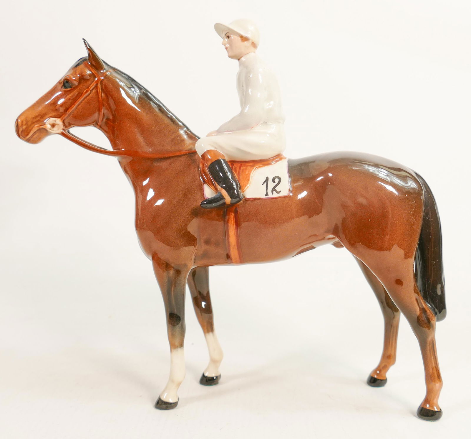 Beswick jockey on bay horse 1862, light blue racing colours, over painted jacket. (1 of 4)