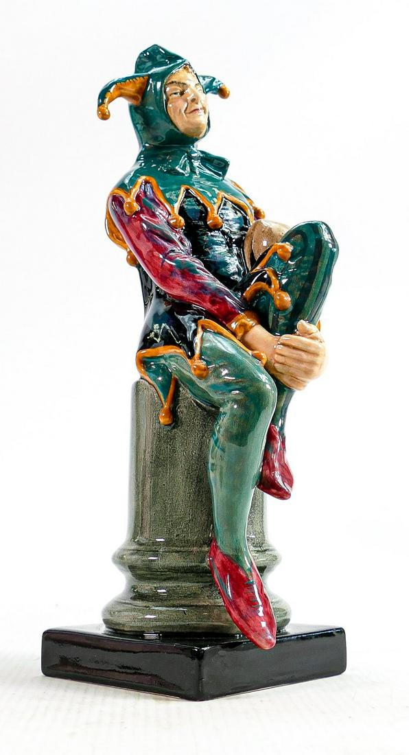 Royal Doulton prototype earthenware figure of a Jester painted in a green, red and orange colourway, (1 of 3)