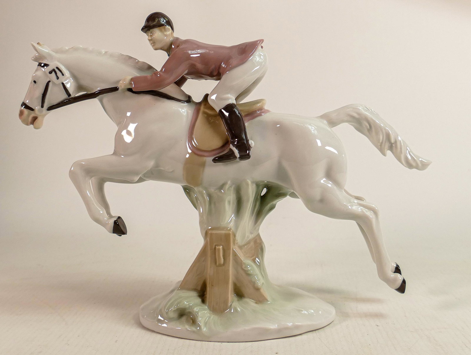 Carl Scheidig Grafenthal continental porcelain figure of jumping huntsman, height 19cm.: Carl Scheidig Grafenthal continental porcelain figure of jumping huntsman, height 19cm.