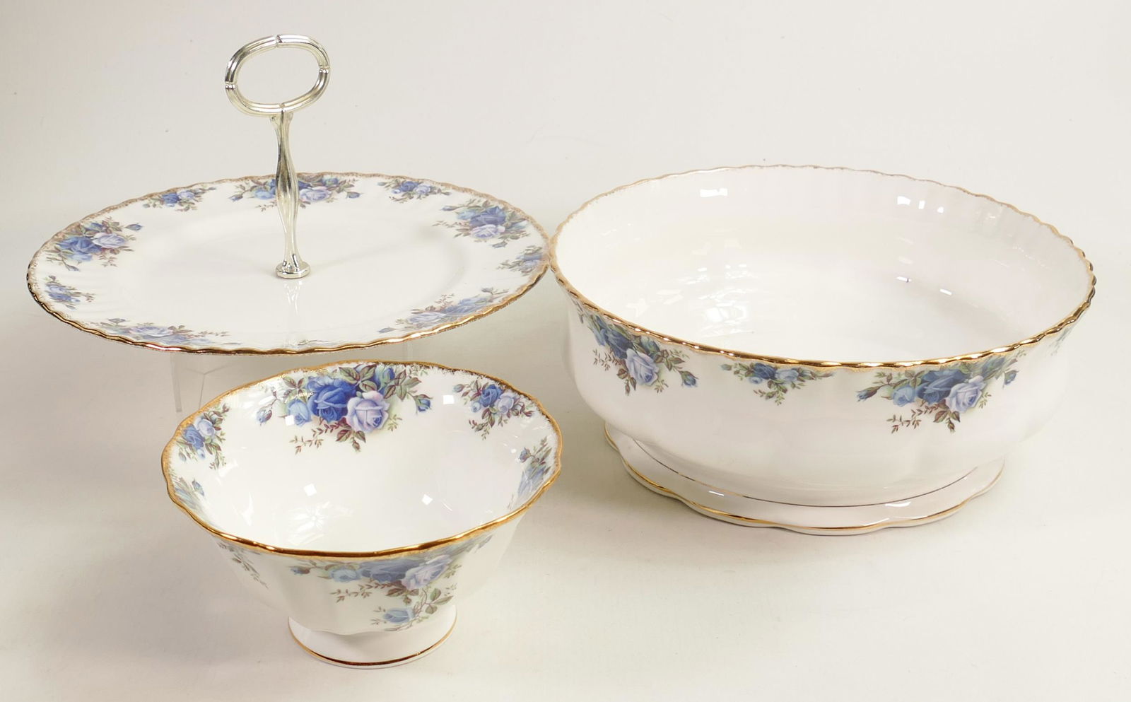 A collection of Royal Albert Moonlight Rose items including - large footed fruit bowl, single cake: A collection of Royal Albert Moonlight Rose items including - large footed fruit bowl, single cake stand & small footed bowl, good condition but some seconds noted. (3)
