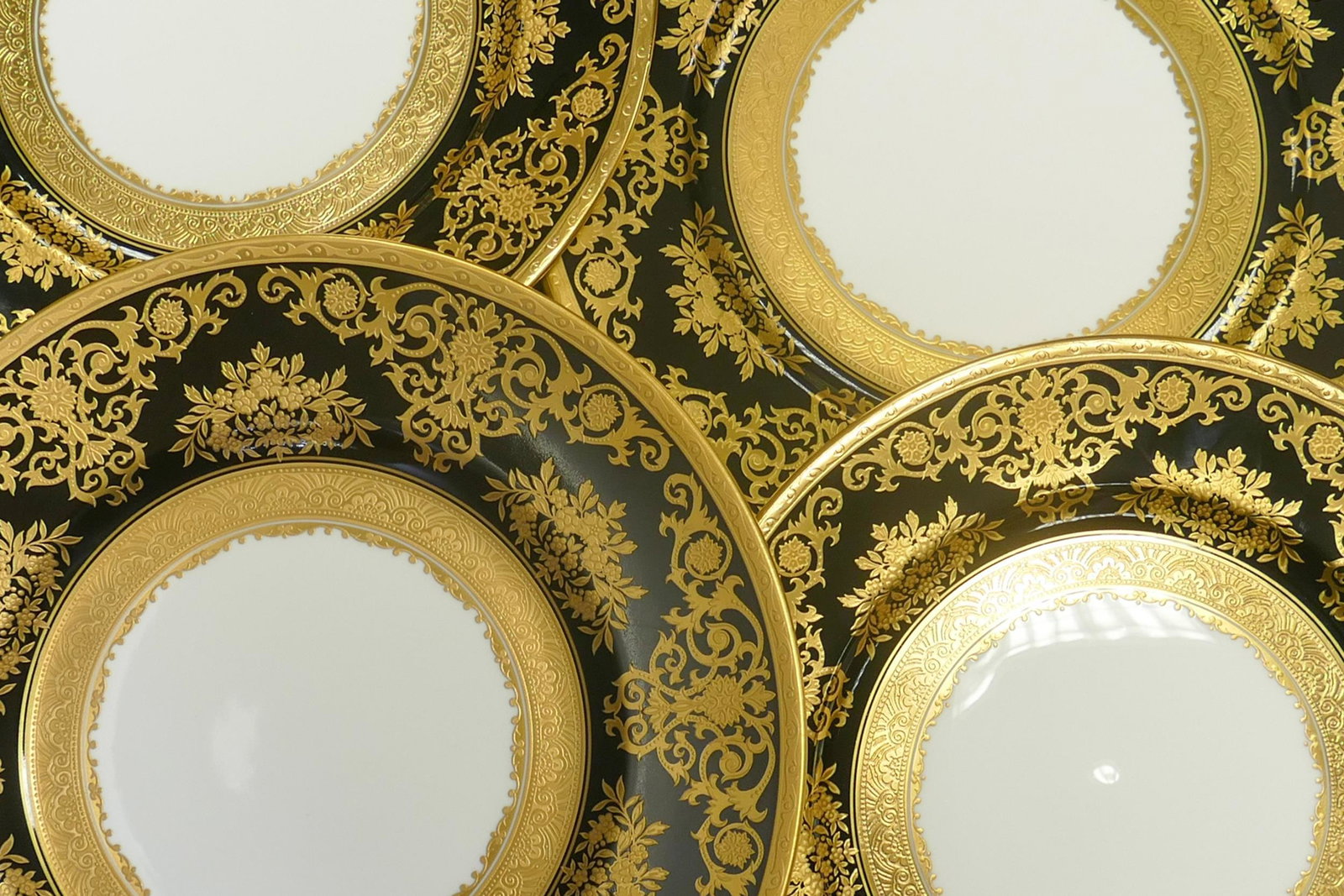 De Lamerie Fine Bone China heavily gilded Black Exotic Garden patterned lunch plates & salad plates,: De Lamerie Fine Bone China heavily gilded Black Exotic Garden patterned lunch plates & salad plates, specially made high end quality items, made in England, largest diameter 22.5cm. (4)