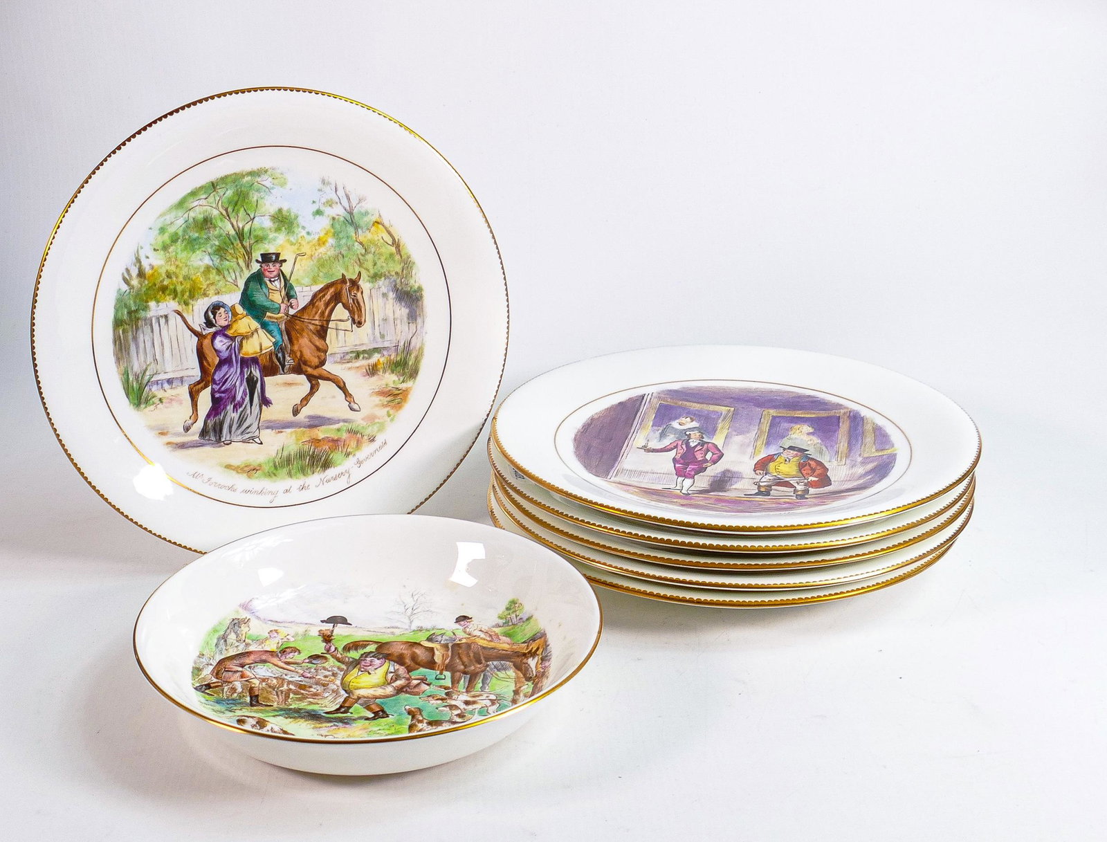 A set of Wedgwood plates, each plate depicting Jorrocks comical hunting scenes together with a bowl,: A set of Wedgwood plates, each plate depicting Jorrocks comical hunting scenes together with a bowl, retailers mark Phillips Ltd., 43 & 44 New Bond Street, d.23.5cm. (7)
