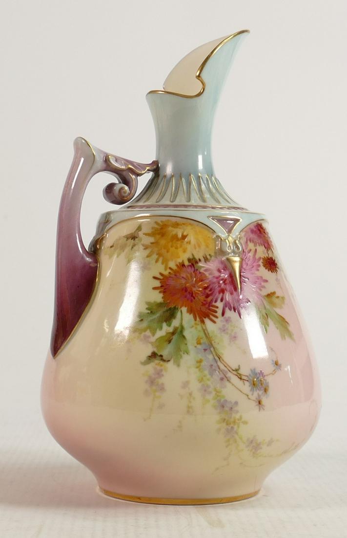 Royal Worcester hand painted Floral design ewer, puce backstamp, height 17.5cm.: Royal Worcester hand painted Floral design ewer, puce backstamp, height 17.5cm.