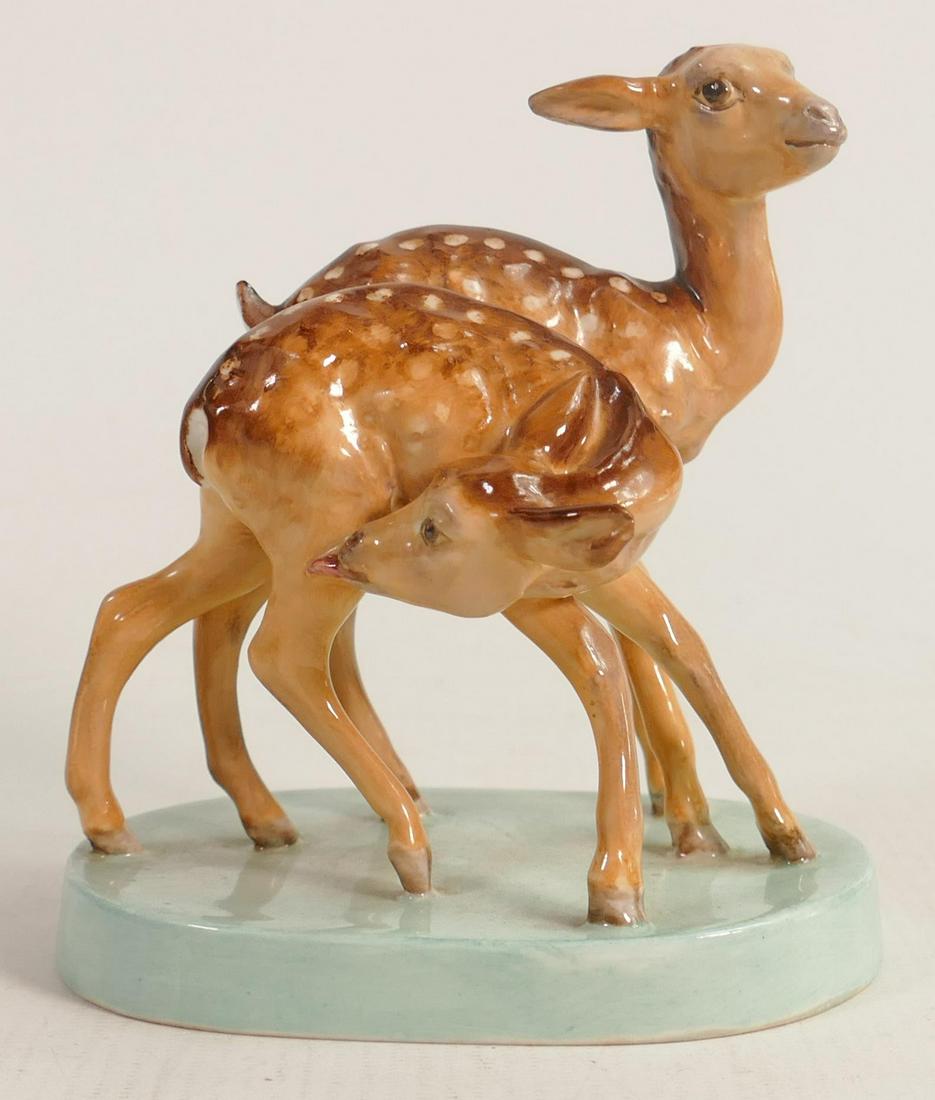 Royal Worcester model of young spotted deer modelled by Doris Lindner, green backstamp, h.13.5cm.: Royal Worcester model of young spotted deer modelled by Doris Lindner, green backstamp, h.13.5cm.